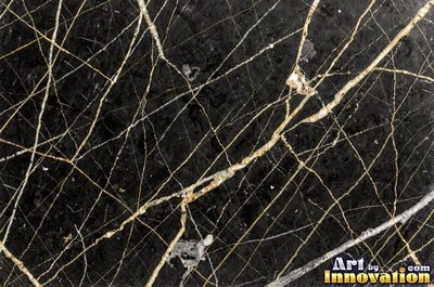 Tumbled slate blue marble with soft worn edges and faded veins