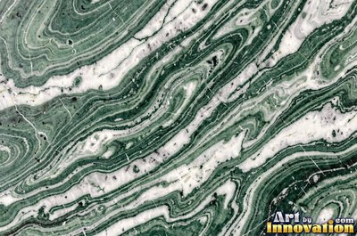 Polished white marble with a few thin gold-like veins