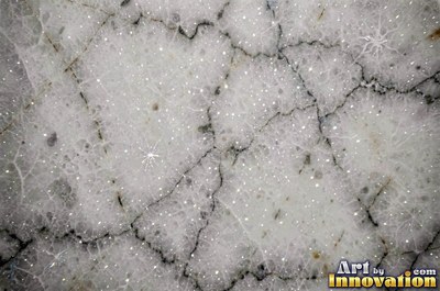 Tumbled slate blue marble with soft worn edges and faded veins