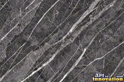Polished white marble with a few thin gold-like veins
