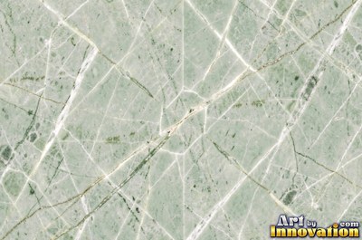Tumbled slate blue marble with soft worn edges and faded veins