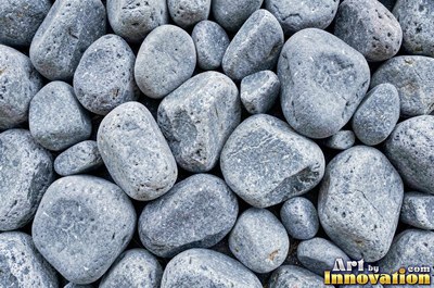 Large smooth blue gray boulders set tight with dark gaps