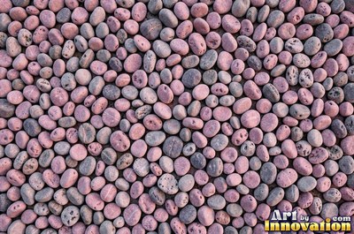 Large smooth blue gray boulders set tight with dark gaps
