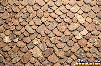 Earthy brown flat stones overlapping across the whole frame