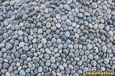 Large smooth blue gray boulders set tight with dark gaps