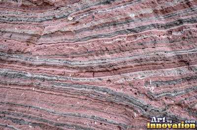 Polished warm beige sandstone showing fine sand grains