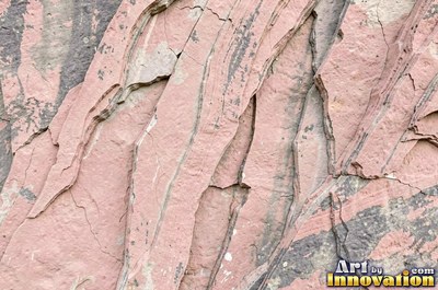 Polished warm beige sandstone showing fine sand grains