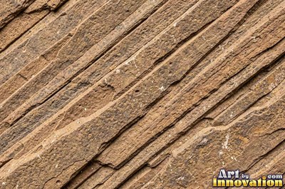 Polished warm beige sandstone showing fine sand grains