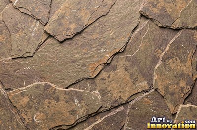 Stratified sedimentary rock in thin bands of sandy tan