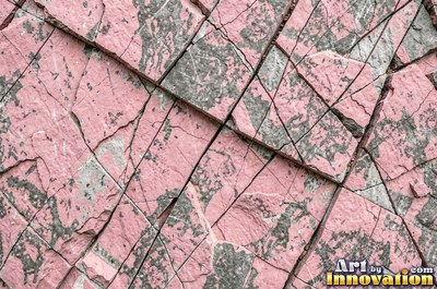 Dry stacked stone wall of flat blue gray slate pieces