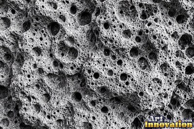 Stratified sedimentary rock in thin bands of sandy tan
