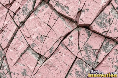 Stratified sedimentary rock in thin bands of sandy tan