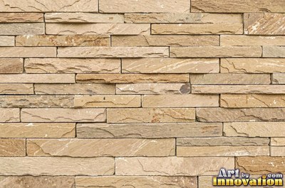 Stratified sedimentary rock in thin bands of sandy tan
