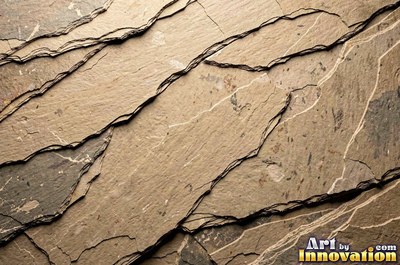 Cleft slate surface with natural ripples and ridges in near black