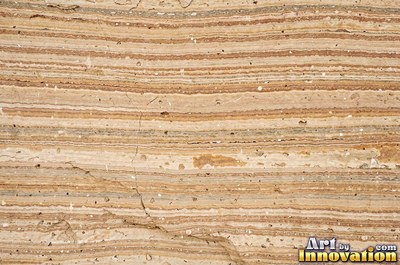 Cleft slate surface with natural ripples and ridges in near black