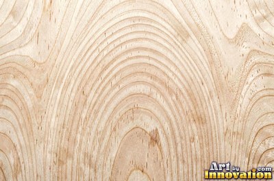 Flowing cathedral grain arches in a planed hardwood board