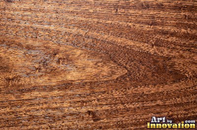 Spalted wood with thin dark zone lines wandering through pale grain