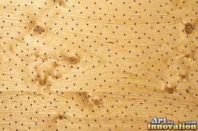 Tight quarter sawn wood grain with shimmering ray flecks along the board