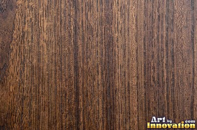 Rough sawn wood with circular saw marks crossing the open grain