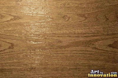 Flowing cathedral grain arches in a planed hardwood board