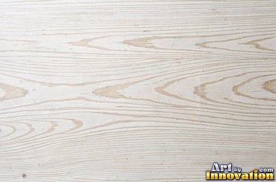 Spalted wood with thin dark zone lines wandering through pale grain