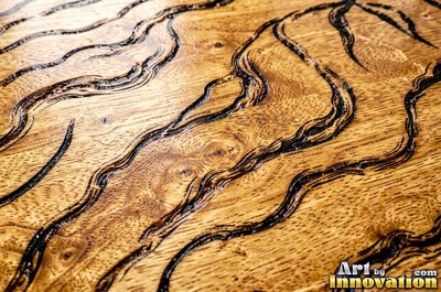 Tight quarter sawn wood grain with shimmering ray flecks along the board