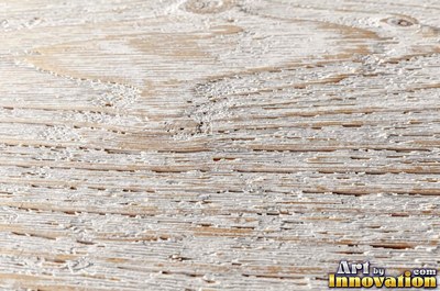 Tight quarter sawn wood grain with shimmering ray flecks along the board