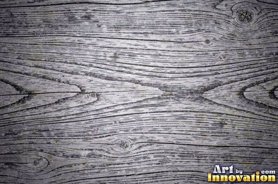 Flowing cathedral grain arches in a planed hardwood board