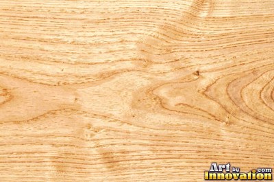 Flowing cathedral grain arches in a planed hardwood board