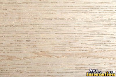 Flowing cathedral grain arches in a planed hardwood board