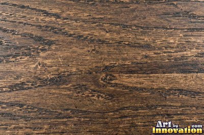 Spalted wood with thin dark zone lines wandering through pale grain