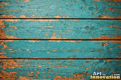 Distressed painted planks rubbed through to bare wood along every edge