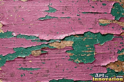 Distressed painted planks rubbed through to bare wood along every edge