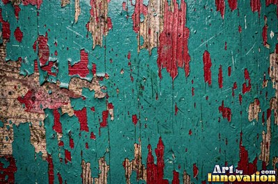 Distressed painted planks rubbed through to bare wood along every edge