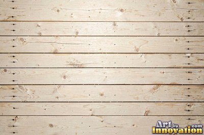 Rows of narrow hardwood floor planks in staggered courses with tight seams