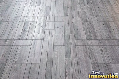 Long deck boards with rounded edges and dark screw heads in neat lines