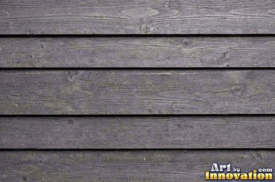 Long deck boards with rounded edges and dark screw heads in neat lines