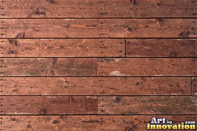 Long deck boards with rounded edges and dark screw heads in neat lines