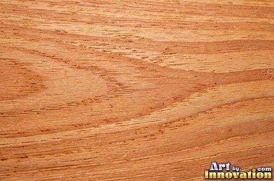 Long deck boards with rounded edges and dark screw heads in neat lines