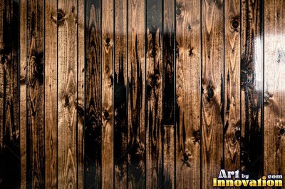 Tall vertical planks of old growth timber in a deep translucent stain