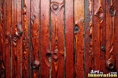 Rough sawn timber boards with faint saw marks under a dark walnut stain
