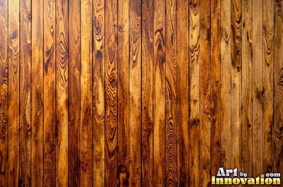 Vertical barn boards in oxblood red stain with every knot showing through