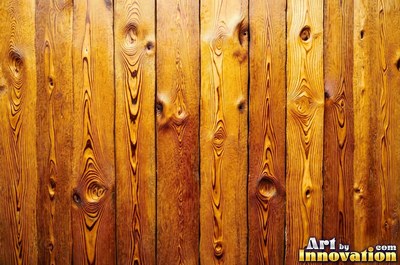 Rough sawn timber boards with faint saw marks under a dark walnut stain