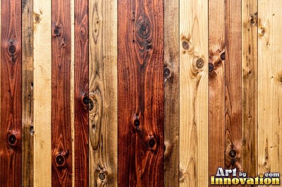 Rough sawn timber boards with faint saw marks under a dark walnut stain