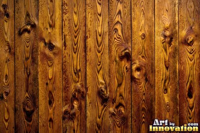 Tall vertical planks of old growth timber in a deep translucent stain