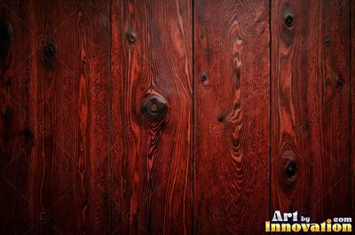 Tall vertical planks of old growth timber in a deep translucent stain