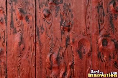 Wide boards in espresso brown stain with hairline checks and nail holes