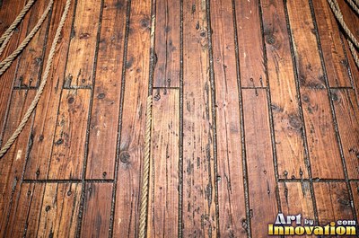 Silver gray barn siding filling the frame under soft even light