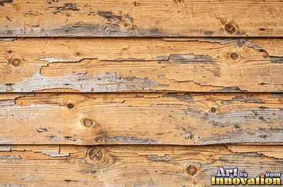 Rough hewn beams with axe marks and dark age cracks in cedar orange