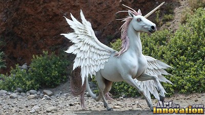 Trotting with wings spread wide, a pure white alicorn moves across a rocky path
